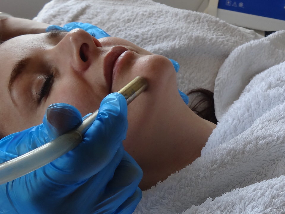 Microdermabrasion skin resurfacing and hydration polishing the skin.